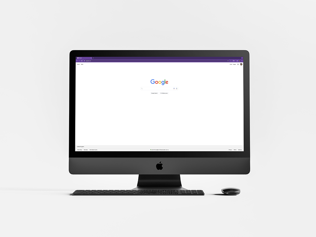 A desktop computer screen displaying the Google homepage on a plain white background. The simplicity and balanced layout demonstrate the Gestalt principle of symmetry, where elements are evenly distributed to create a sense of balance and harmony.