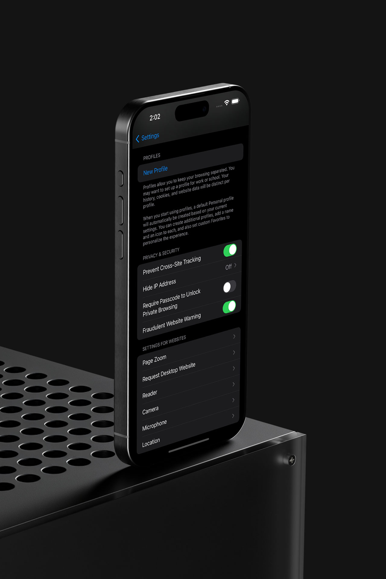 Smartphone displaying security and privacy settings in its interface, placed vertically on a dark textured surface with circular cutouts.