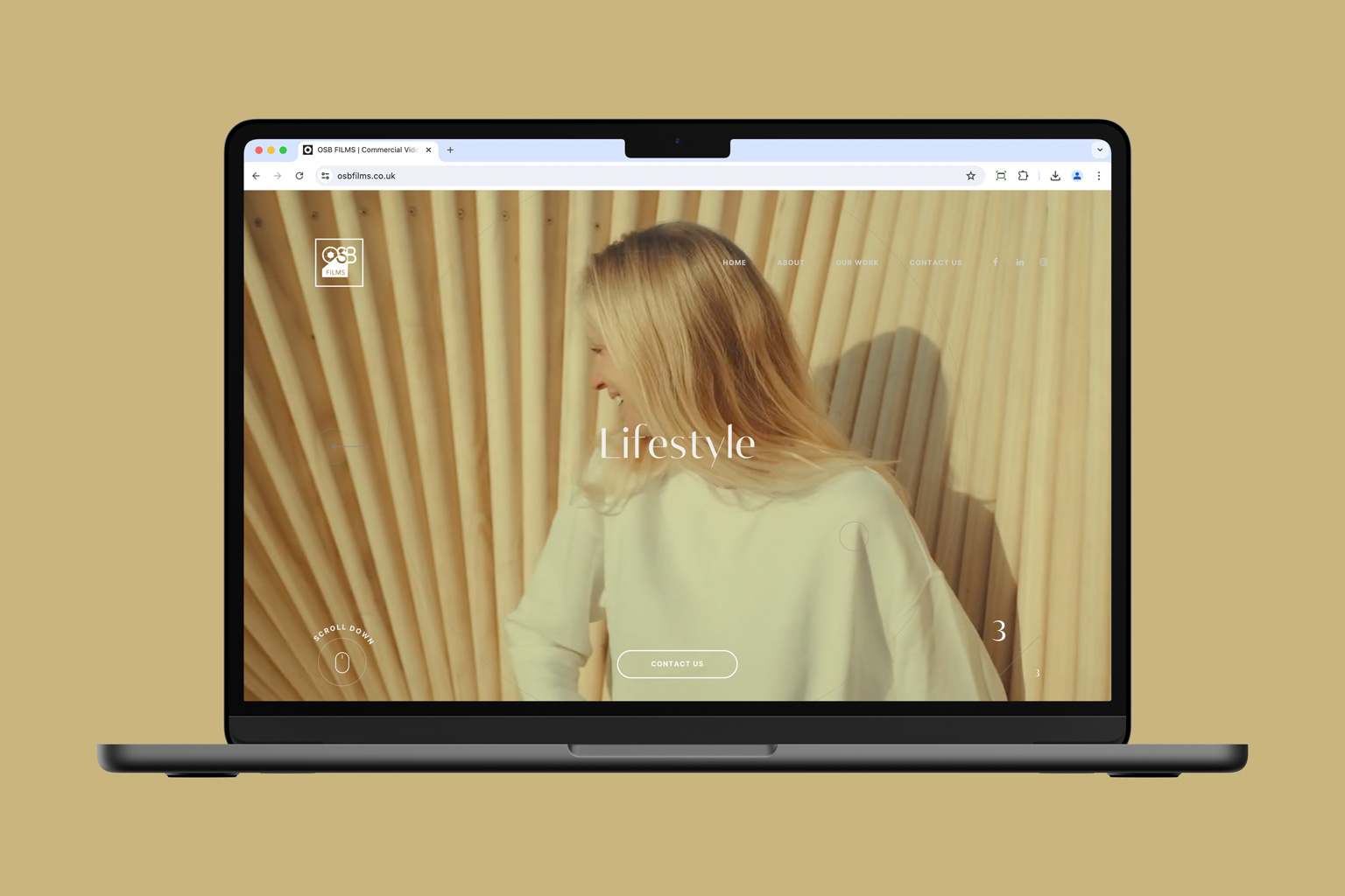 Laptop displaying a minimalist website for a film production company featuring a blonde woman in a pastel room.