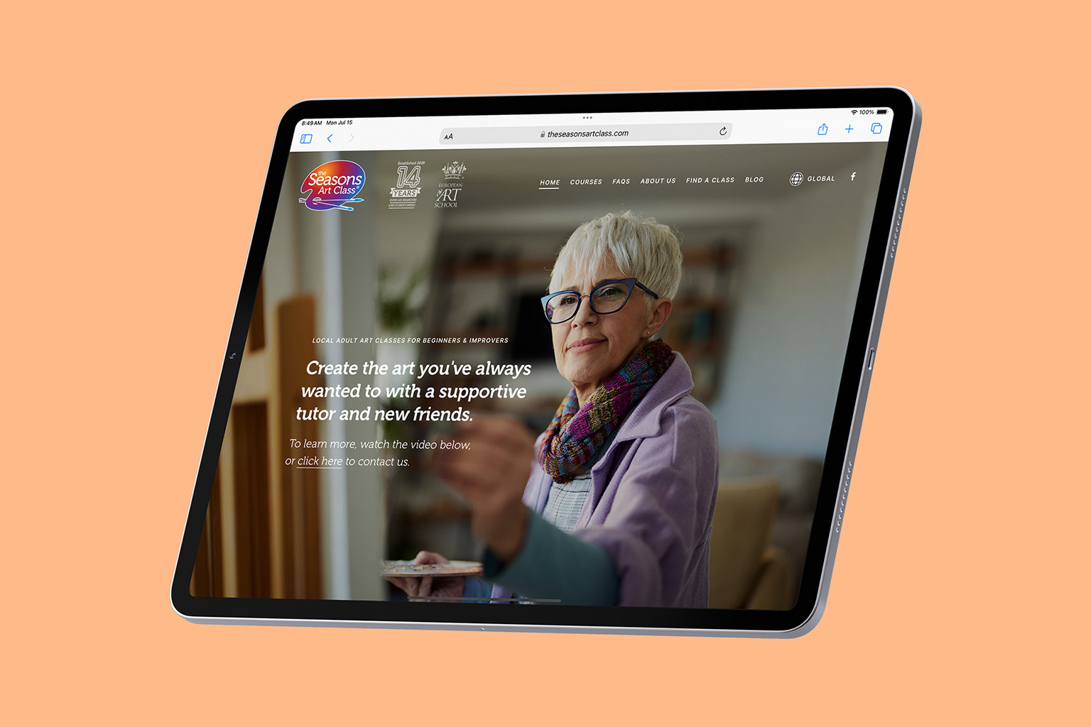 Tablet displaying an art class website with a senior woman painting in a sunny, artistic home environment.